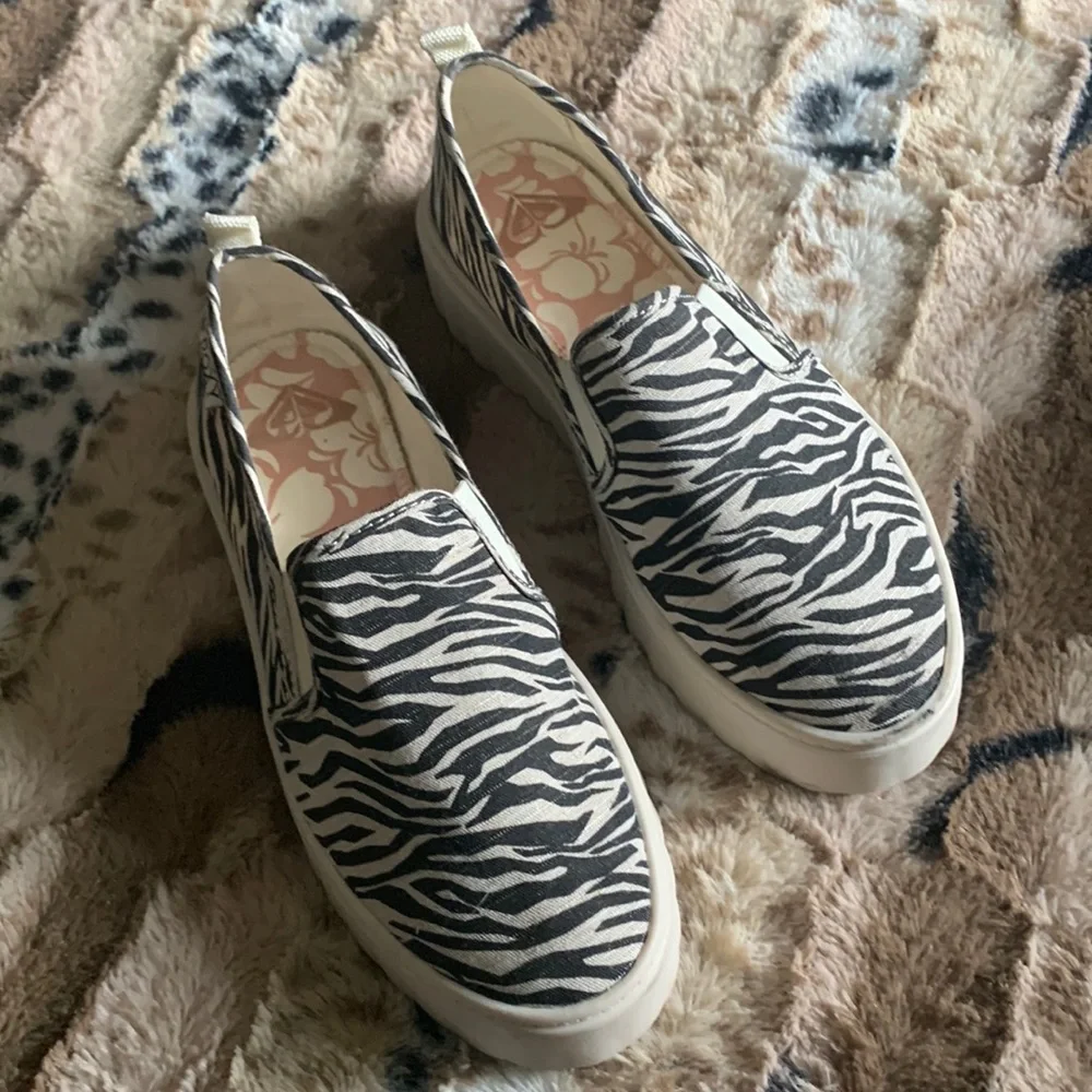 Roxy Zebra Print Platform Slip-On Sneakers in Black and Cream